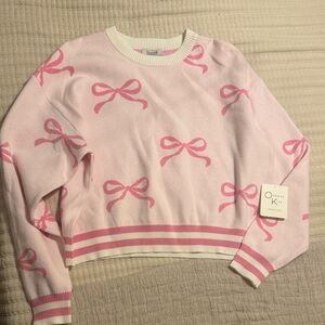 Elegant Pink Bow Sweater by O.K.S